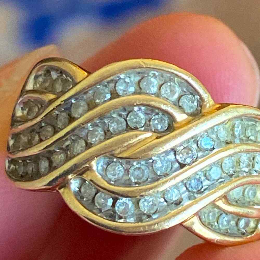 Elegant Gold and Silver Wave Ring